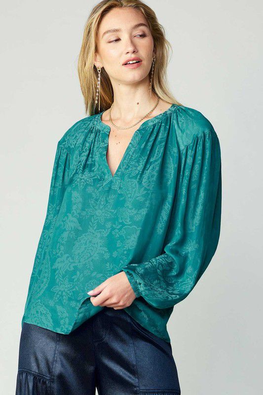 Blusa satinada con brocado