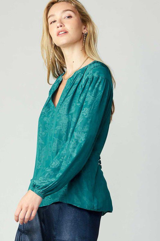 Blusa satinada con brocado