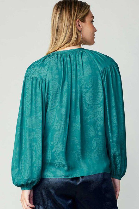 Blusa satinada con brocado