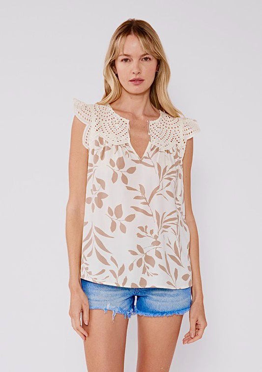 Blusa estampada con guipur