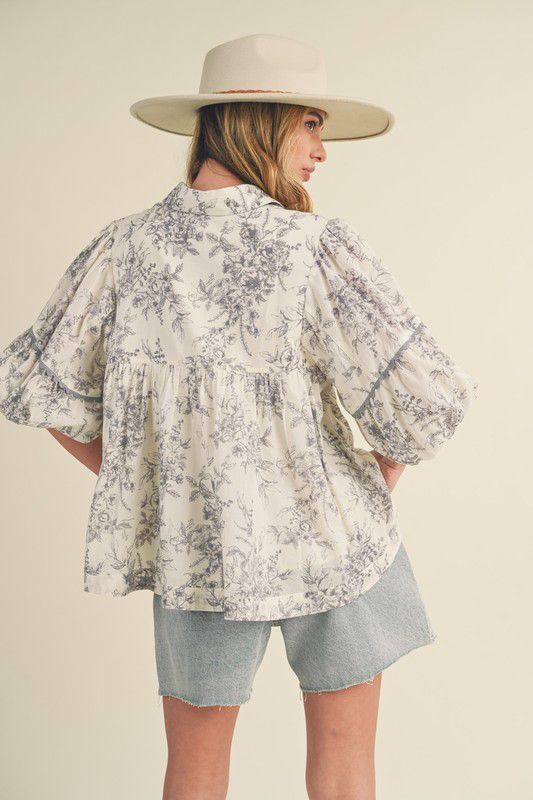 Blusa estampada con canesú y detalle de cintilla