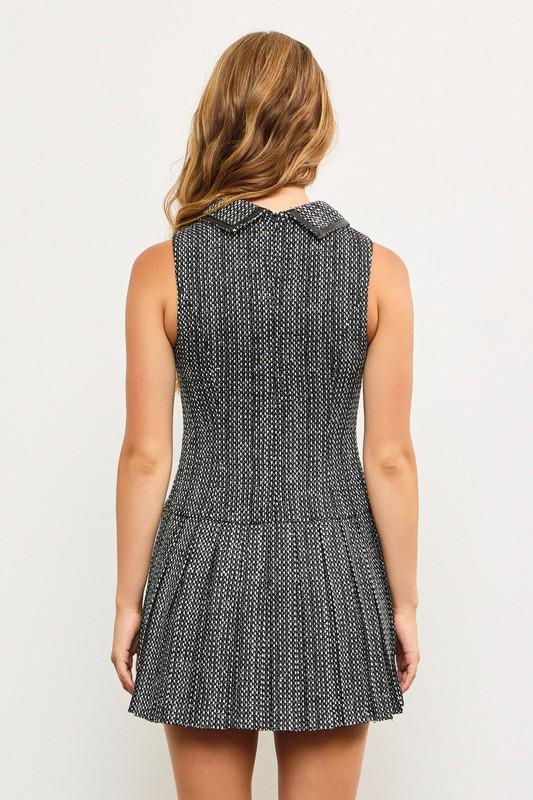 Vestido tejido estilo tweed con detalle de vinipiel en cuello