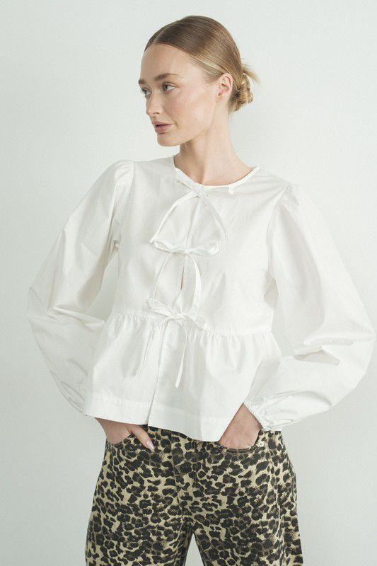 Blusa con amarres de moño al frente